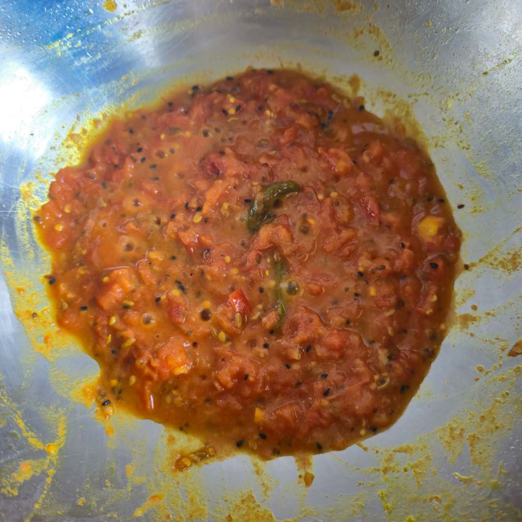 Cooking until the tomatoes turn jelly-like