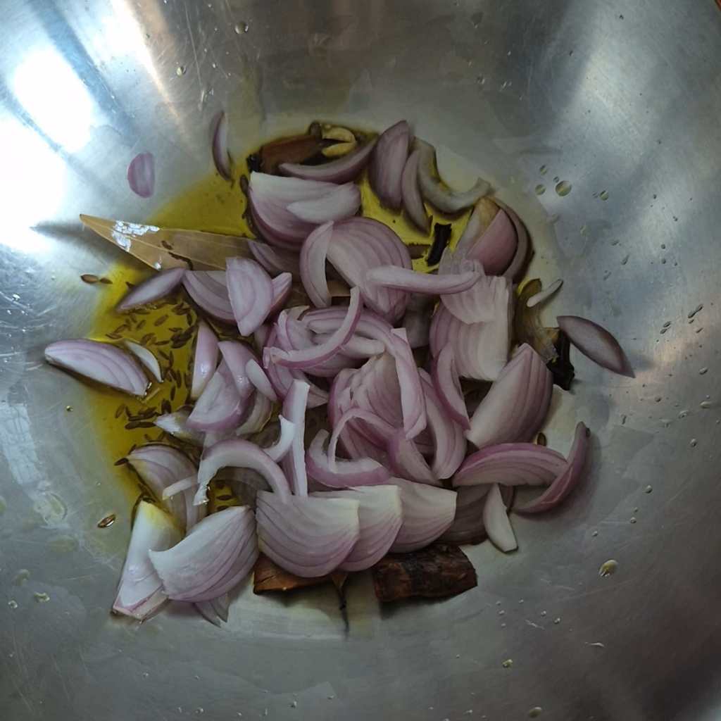 Frying onions in a pan